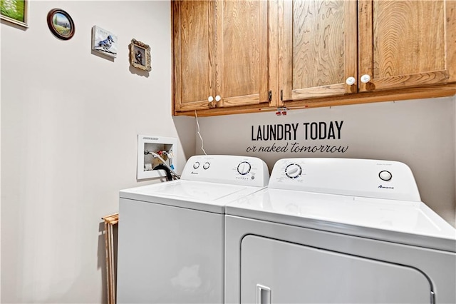 laundry room featuring washer and dryer and cabinet space