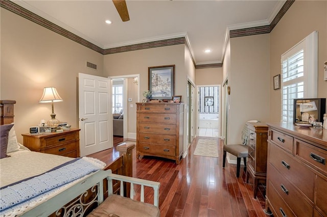 bedroom featuring crown molding, recessed lighting, visible vents, dark wood-type flooring, and baseboards