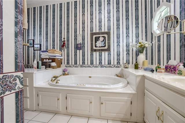 full bathroom with wallpapered walls, tile patterned flooring, a garden tub, and vanity