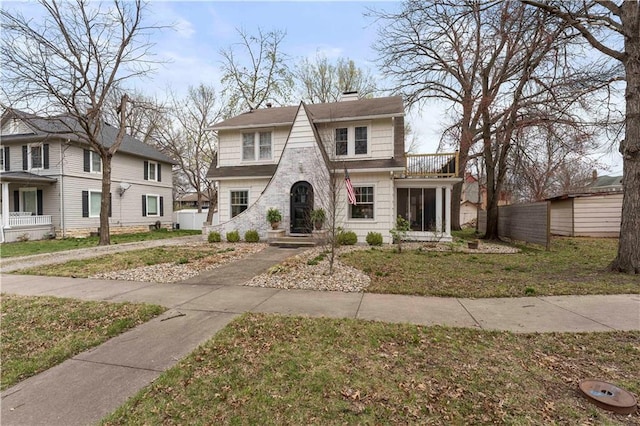 319 S Elm St, Ottawa, KS 66067 - view of front of home with a chimney