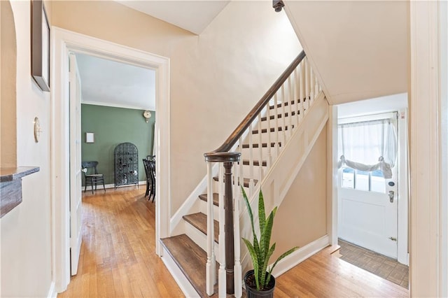 319 S Elm St, Ottawa, KS 66067 - stairway with wood finished floors