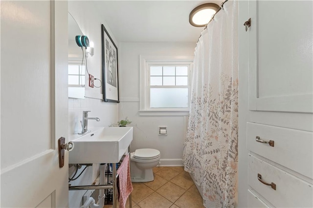 319 S Elm St, Ottawa, KS 66067 - full bathroom with tile patterned floors and curtained shower