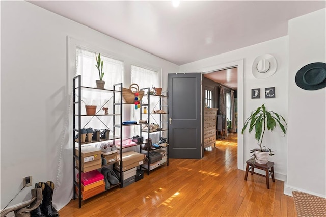 319 S Elm St, Ottawa, KS 66067 - interior space featuring light wood-type flooring and baseboards