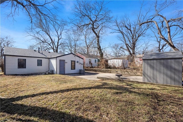 view of yard with a patio area and an outdoor structure