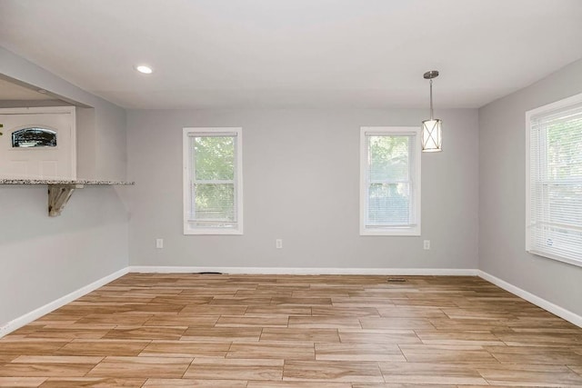 3361 N 60th St, Kansas City, KS 66104 - empty room with baseboards and plenty of natural light