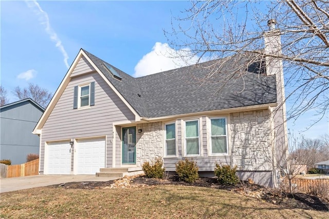 view of front of home with driveway, a shingled roof, a chimney, an attached garage, and fence