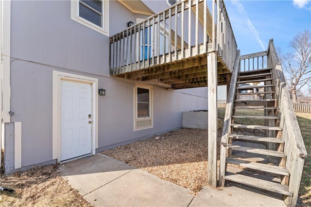 entrance to property with a deck