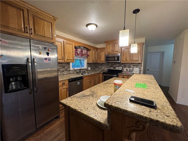 1403 E Mechanic St, Harrisonville, MO 64701 - kitchen with dark wood-type flooring, appliances with stainless steel finishes, brown cabinets, and tasteful backsplash