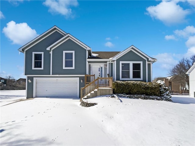 split level home featuring an attached garage