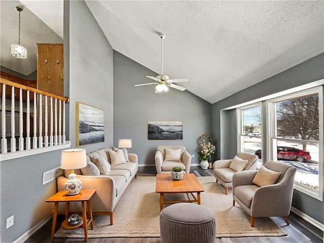 living room featuring wood finished floors and baseboards