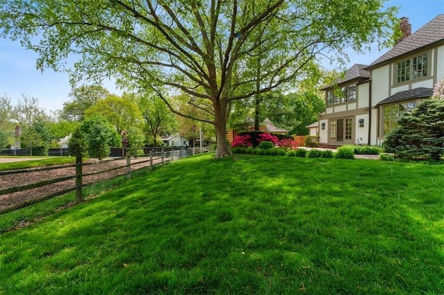view of yard with fence