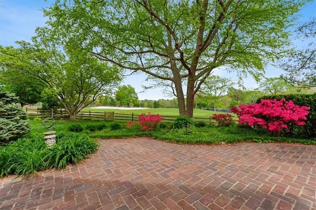 view of patio featuring fence