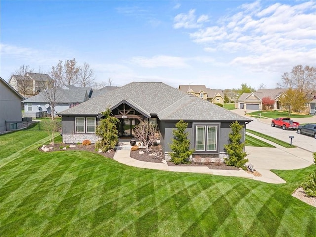 20880 W 224th St, Spring Hill, KS 66083 - view of front facade featuring stone siding, a front lawn, a shingled roof, and a residential view