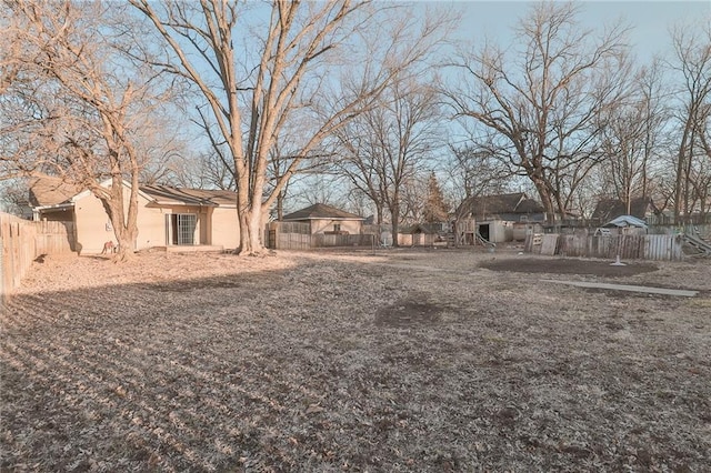 view of yard with a fenced backyard