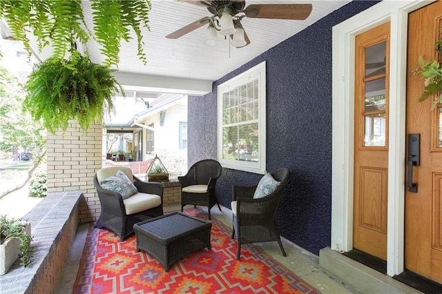 view of patio / terrace featuring ceiling fan