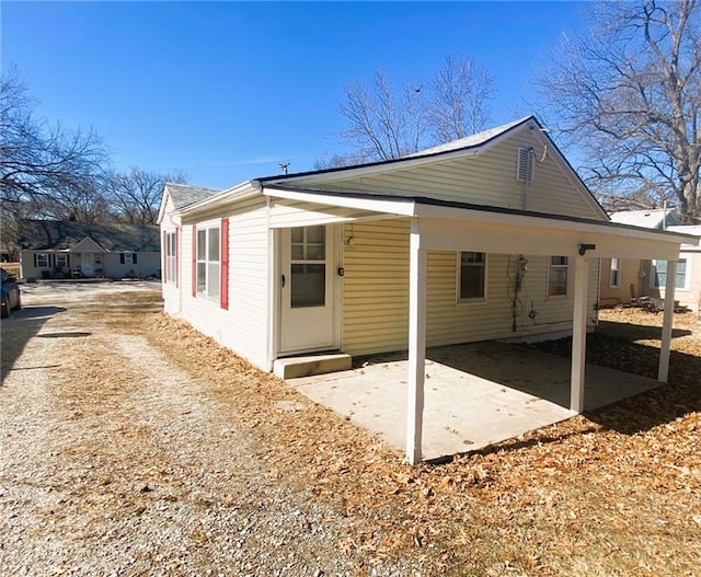 back of property with driveway