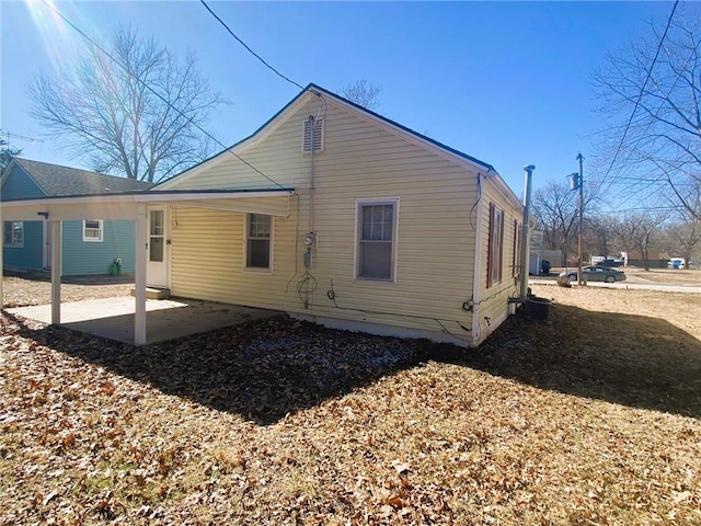 back of property featuring a patio area