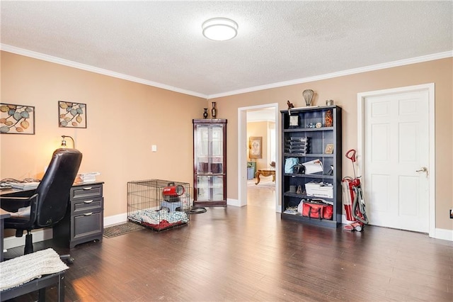 office featuring dark wood-style floors, a textured ceiling, baseboards, and crown molding