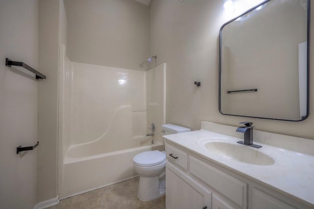 full bathroom featuring toilet, tile patterned flooring, vanity, and bathing tub / shower combination