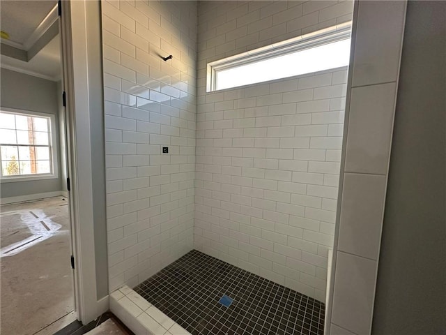 full bath with a stall shower and crown molding