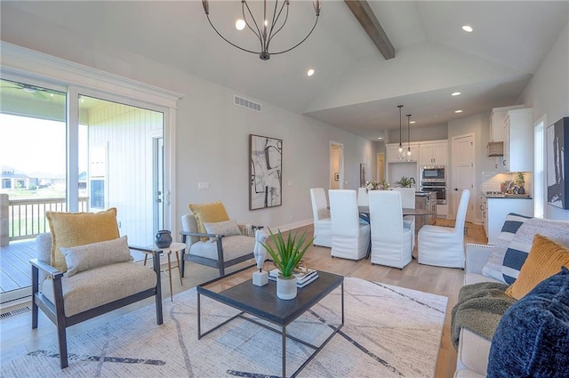 17372 S Kaw St, Olathe, KS 66062 - living room featuring a chandelier, light wood-type flooring, and recessed lighting