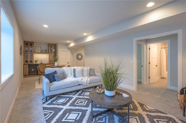 17372 S Kaw St, Olathe, KS 66062 - living room with light colored carpet, baseboards, and recessed lighting
