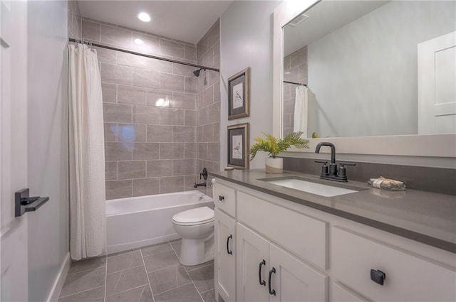 17372 S Kaw St, Olathe, KS 66062 - bathroom featuring vanity, toilet, shower / bath combo with shower curtain, tile patterned floors, and baseboards