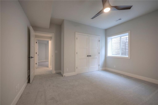 17372 S Kaw St, Olathe, KS 66062 - unfurnished bedroom featuring carpet floors, baseboards, a closet, and ceiling fan