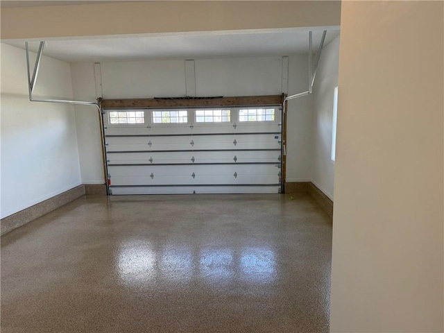 17372 S Kaw St, Olathe, KS 66062 - garage featuring baseboards