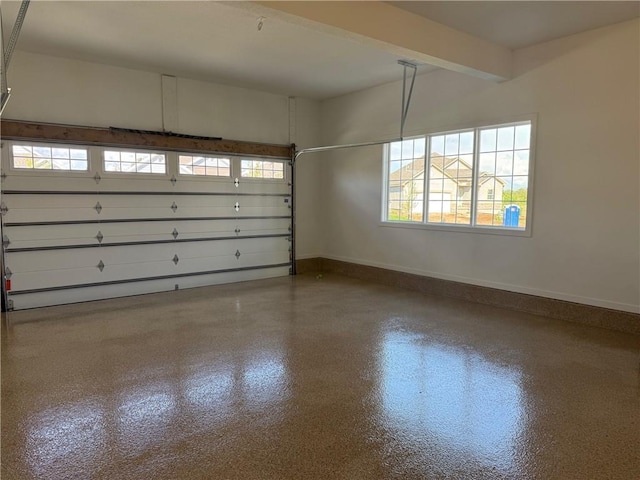 17372 S Kaw St, Olathe, KS 66062 - garage featuring baseboards