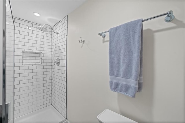 bathroom with recessed lighting and a shower stall