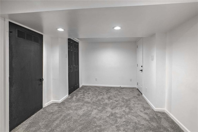 unfurnished bedroom featuring carpet floors, recessed lighting, visible vents, and baseboards