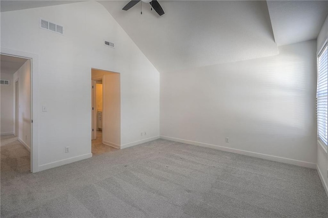 spare room with visible vents, ceiling fan, and carpet flooring