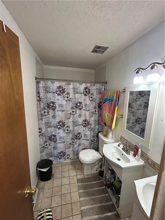 full bath featuring curtained shower, visible vents, toilet, vanity, and tile patterned flooring