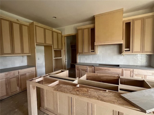 12604 W 170th St, Overland Park, KS 66221 - kitchen with tasteful backsplash, stovetop, and concrete floors