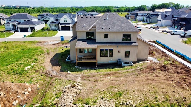 12604 W 170th St, Overland Park, KS 66221 - back of property featuring a residential view and roof with shingles