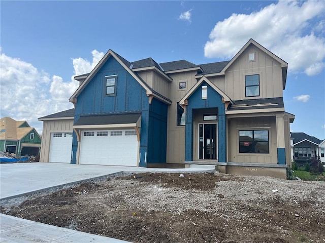 12604 W 170th St, Overland Park, KS 66221 - view of front of house featuring board and batten siding, driveway, roof with shingles, and an attached garage