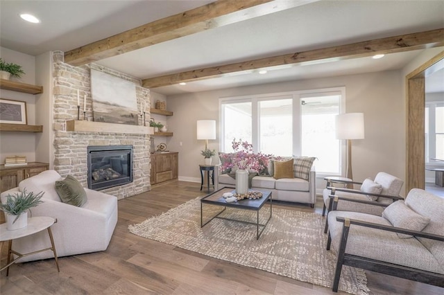 12604 W 170th St, Overland Park, KS 66221 - living area featuring beamed ceiling, a fireplace, wood finished floors, and recessed lighting