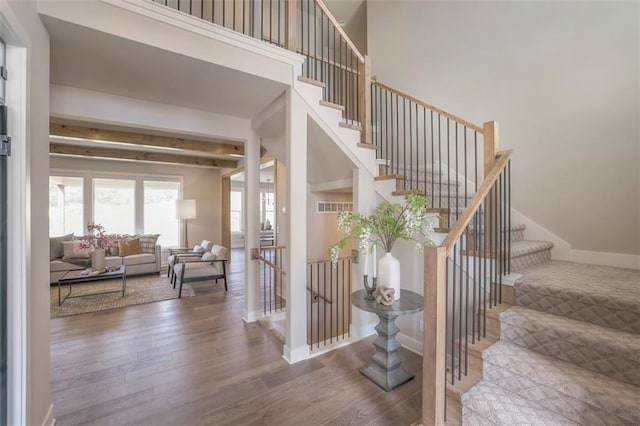 12604 W 170th St, Overland Park, KS 66221 - staircase featuring wood finished floors and baseboards
