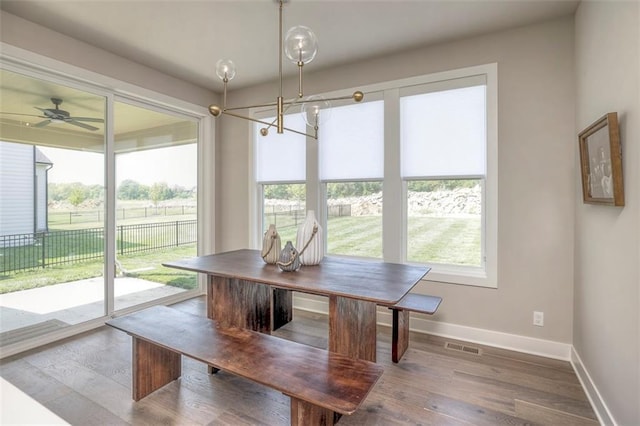 12604 W 170th St, Overland Park, KS 66221 - dining space featuring healthy amount of natural light, wood finished floors, and a ceiling fan