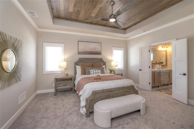 12604 W 170th St, Overland Park, KS 66221 - bedroom featuring a tray ceiling, wooden ceiling, light carpet, ensuite bath, and a ceiling fan