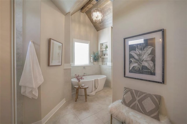 12604 W 170th St, Overland Park, KS 66221 - bathroom with a freestanding bath, a chandelier, and tile patterned flooring
