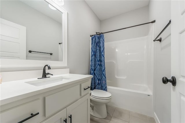 full bathroom featuring toilet, shower / tub combo, vanity, and tile patterned floors