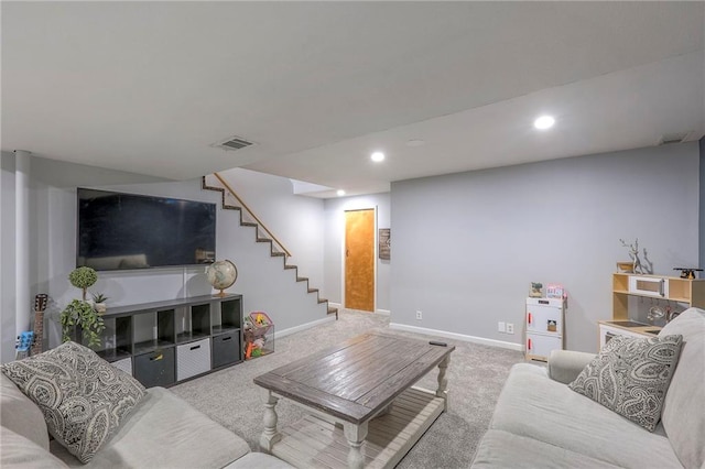 living room featuring baseboards, visible vents, stairway, carpet floors, and recessed lighting