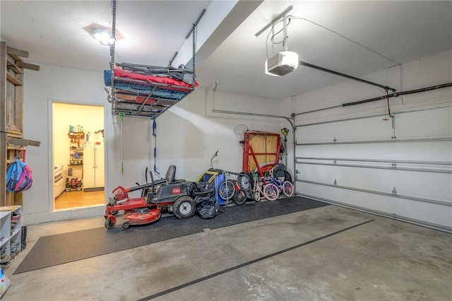 garage featuring a garage door opener