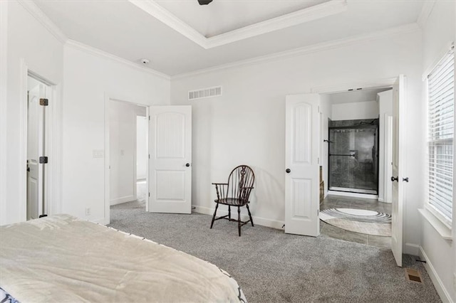 carpeted bedroom featuring baseboards, visible vents, and crown molding