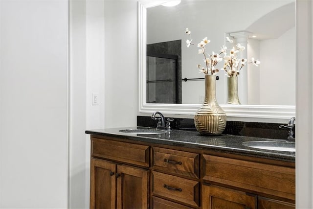 bathroom with double vanity and a sink