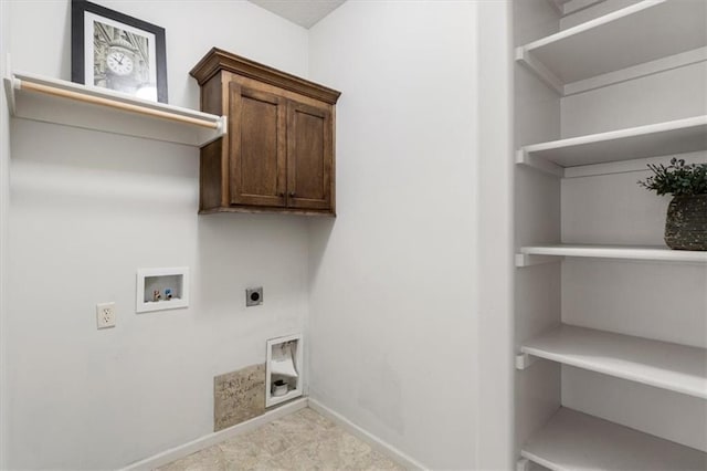 laundry room featuring washer hookup, hookup for an electric dryer, cabinet space, and baseboards