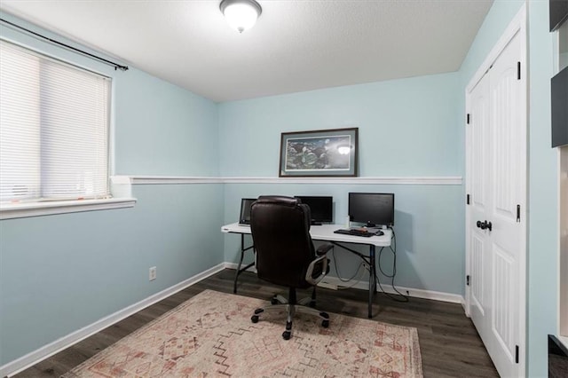 office area featuring wood finished floors and baseboards