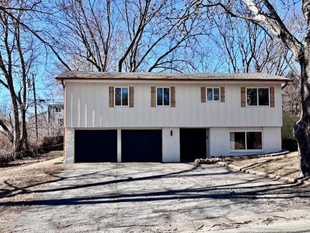 view of front of home featuring driveway and an attached garage